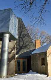 You might be thinking, What kind of painting did he give? The gift was art; however, it was not traditional. Woodhouse had donated Franky Gehry s 1987-built Winton Guest House to the university.
