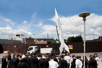 A community focus School students with the Skybolt rocket.