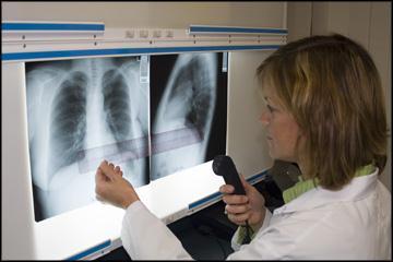 a) A typical day for the worker: Radiologist examines the patients, obtains medical history and diagnose illness based on the x-rays.