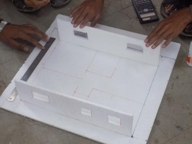 3D Model of a House in Making The materials like thermocol sheet, cutter, glue, pins and markers were provided.
