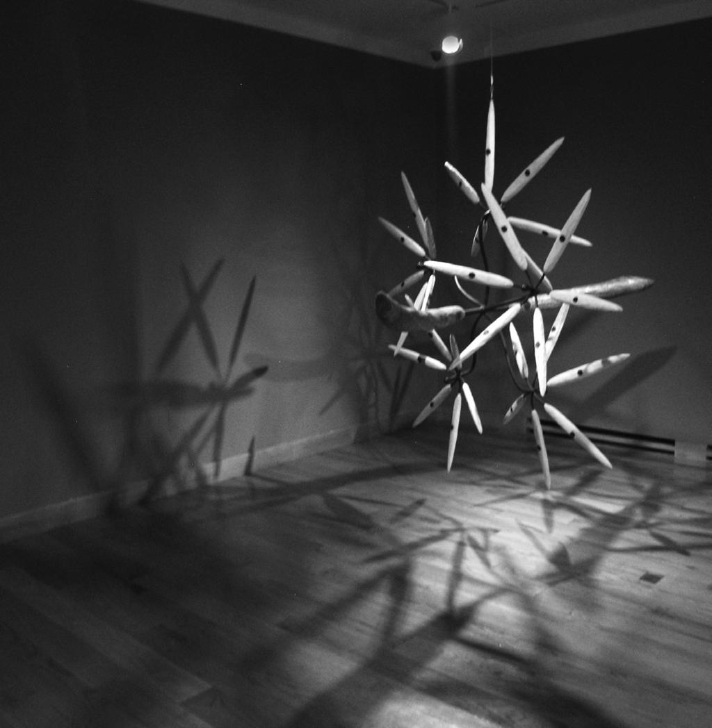 Left: James Surls (American, b. 1943), Me and Two Black Flowers, 2006, Bass, pine, steel, 125-1/2 x 31 x 42 inches, Lent by the artist Right: James Surls (American, b.