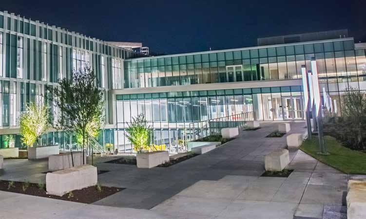 Now, in its new 6,500-square-foot Regnier Hall home, Weigel Library is part of a modern glass nexus between two historic limestone structures.