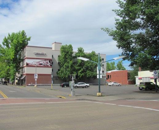 Great central downtown location, close to restaurants, transportation services, government buildings and entertainment venues. Adjacent commercial lot, zoned C-3, fronts 6th Avenue.