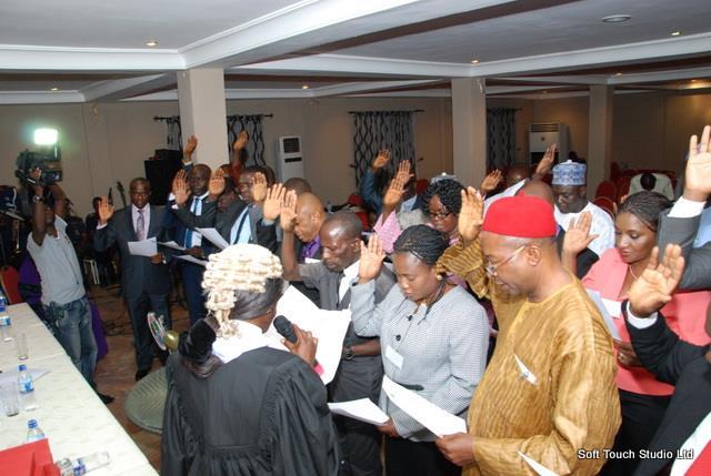 A cross section of fellows and members taking their