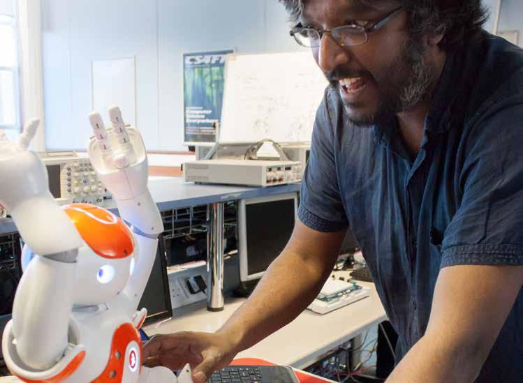 Dr Chrisantha Fernando with his 12,000 cognitive robot, which he is using to explore the idea that natural selection takes place in the brain and explains creativity.