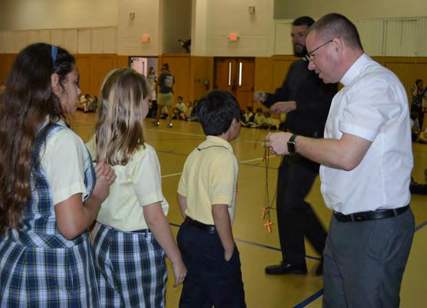 Each class prepared a vocation cheer to present during a Vocation Pep Rally. Fr.
