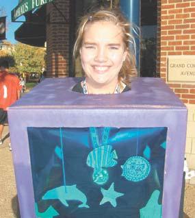 Fairfax s Megan Prosser, 10, who came as an aquarium, won the costume contest.