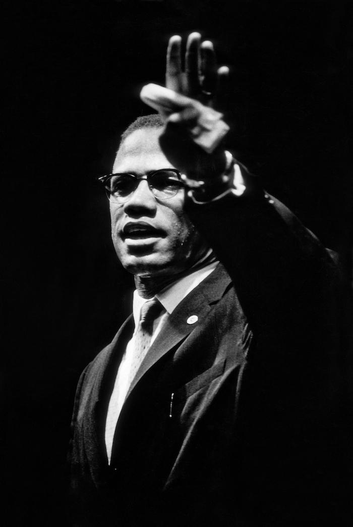 Malcolm X at rally in Chicago, Illinois, 1963 (photo by