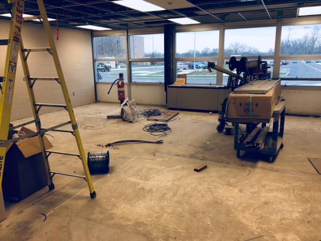 This is inside the old office space that will become 4 additional classrooms and 3 office spaces. The ceiling grid and lighting have been installed and the walls are painted.