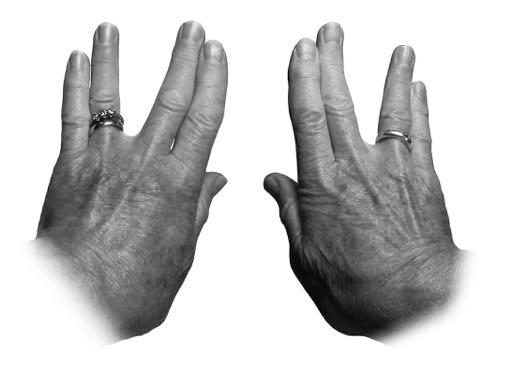 Finger stretch and change Hold your hands straight out in front of you as if you were touching a wall.