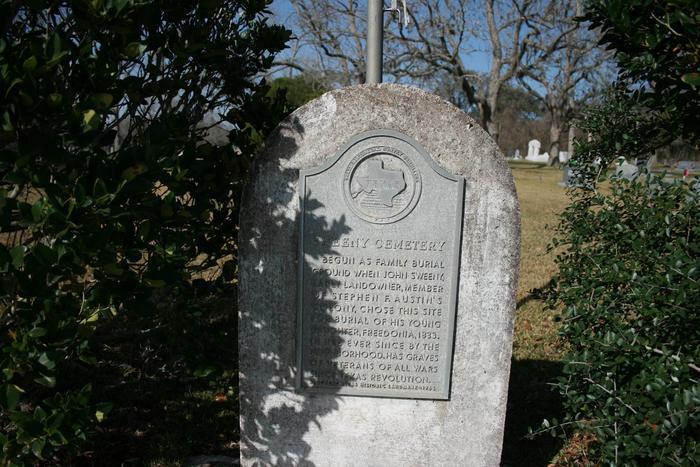 Marker Text: "Begun as family burial ground when John Sweeny, early landowner, member of Stephen F. Austin's colony, chose this site for burial of his young Freedonia, 1833.