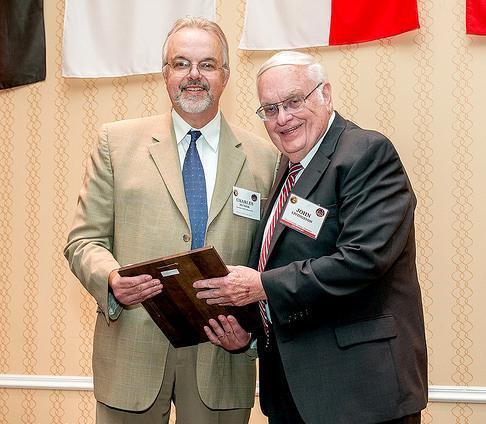 John Livingston was awarded the Educator of the Year Award, presented annually for outstanding achievement in, or