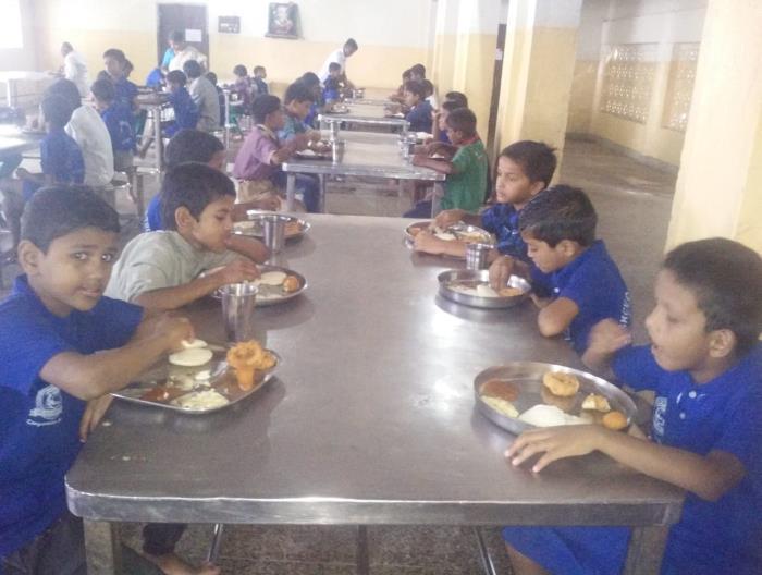 Breakfast to our children at Premvihar Boys Home on the eve of his Birthday.
