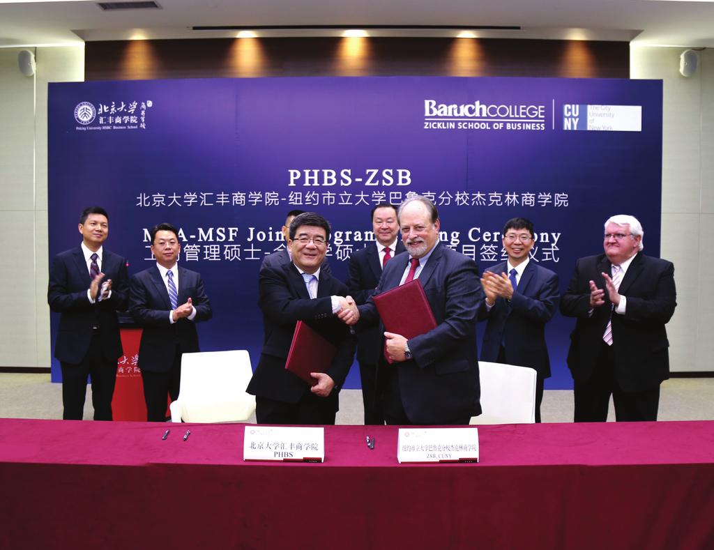 Dean Wen Hai of Peking University HSBC Business School (left) and President Mitchell Wallerstein of Baruch College (right) at the MBA/MSF Dual-Degree program signing ceremony.