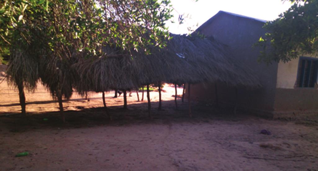A grass roofed classroom at Kaliua,