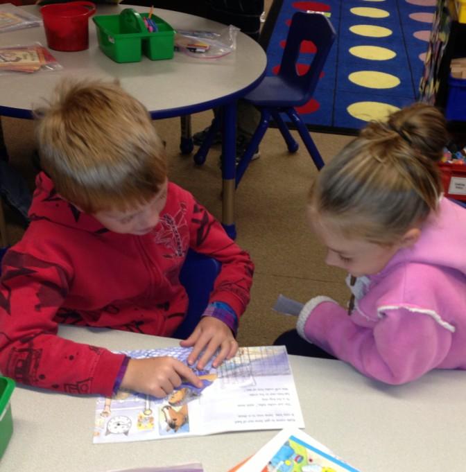 In buddy time, younger students are paired with older mentors from other OCLM classes.