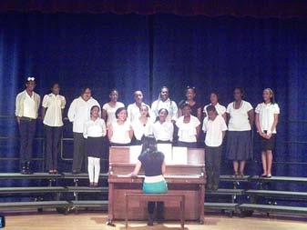 Rembert and the school s chorus led by