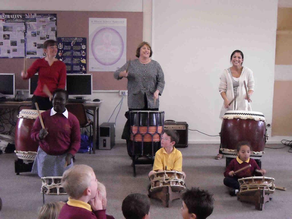 Some staff (including Principal Jo Johnson) and children were chosen to play the instruments.