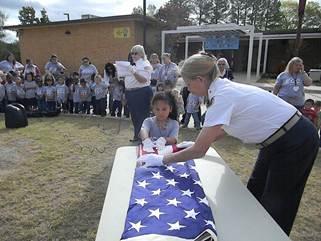 They demonstrated folding the American flag with the