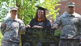 campus news Veterans Memorial Installation From left: Spc. Mae Krayeski, Cortney M. Tyler 12, and Sgt. Jason Browning gather around the veterans memorial prior to Commencement.