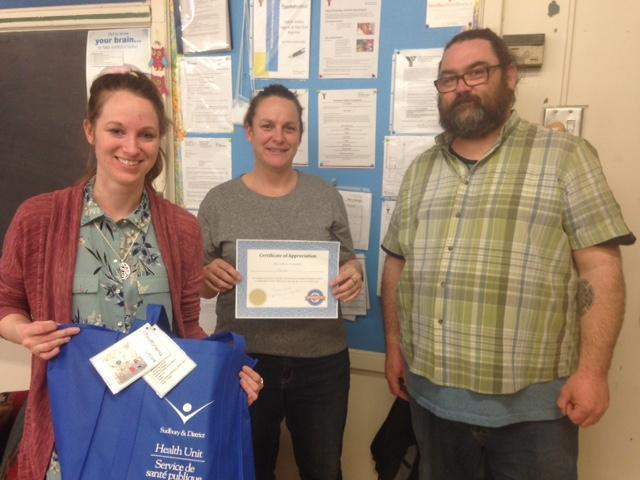 C. Description: YMCA staff were shown our appreciation for their participation and use of their space. They received certificate and Tool Kit!
