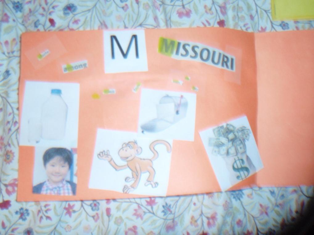 M Page in Meghan s book with words he found in the newspaper with the highlighted letter m, and pictures of words that start with the same sound as her name III.