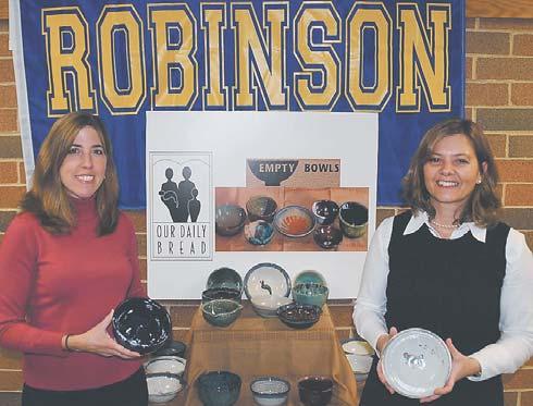 Donated Photo File Photos FCPD Week in Burke News 2 Vie for Delegate Seat Our Daily Bread s Christina Garris and Lisa Whetzel show the bowls created by students at Robinson Secondary School that will
