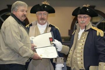 Master Police Officer Mark Macdonald, an officer with the city of Roswell for seven years, was recognized for his bravery and selfless actions and was presented the Sons of the American Revolution