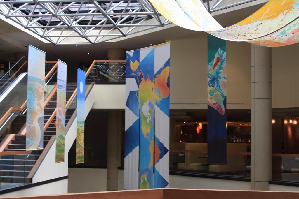 Mary Edna Fraser's batiks hung over the Children's Map Competition, gracing the entrance to the International Trade Exhibition. (Photo by Dierdre Bevington-Attardi.