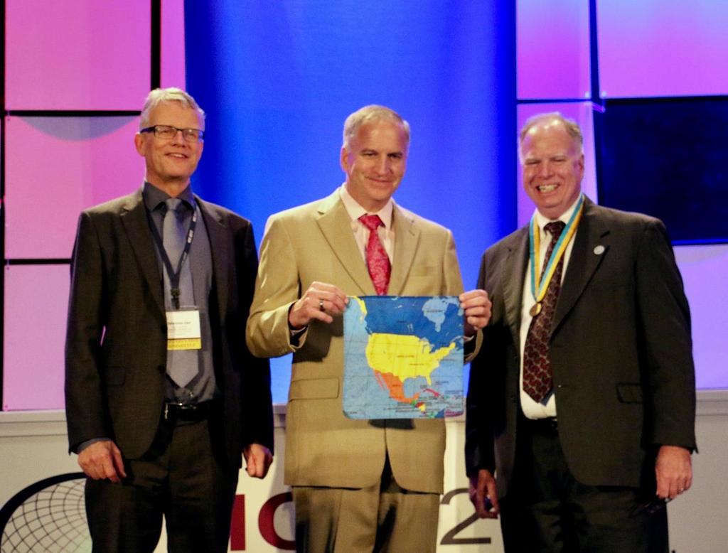 After Robert Cardillo's plenary presentation on Wednesday, (from left to right) Cardillo, Tim Trainor, and Kraak provided a photo opportunity. (Photo by Eric Anderson.