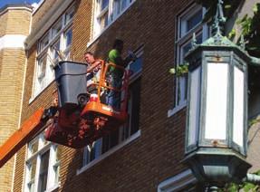 ON CAMPUS MU cuts ribbon on new fitness center Pella workers apply caulking to new windows in Mercy Hall.
