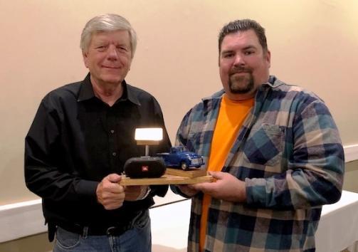 As a token of appreciation, Dan Bremer presented outgoing President Geoff Hardy with a hand-made custom model of his beloved Chevy pick-up Minutes: The November minutes were read by club Secretary
