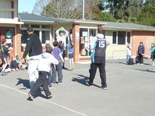 Morgan Natanahira of the NZ breakers Basketball team visit the school last Thursday.