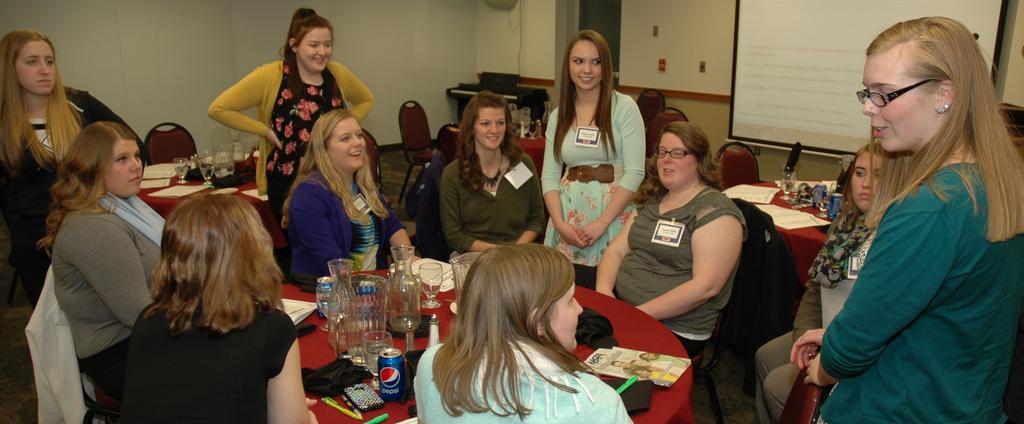 On the Board: Nebraska Wesleyan University s Mikayla Nelson, right, explains the duties of a SEAN Regional Representative to members from the Southeast Region during Spring Conference 2016.