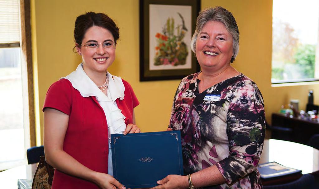 ACHIEVE 2015 AFFORDABILITY Anna Groves LORD FAIRFAX COMMUNITY COLLEGE Scholarship recipient wants to change lives, one library book at a time Lord Fairfax Community College alumnus Anna Groves is the