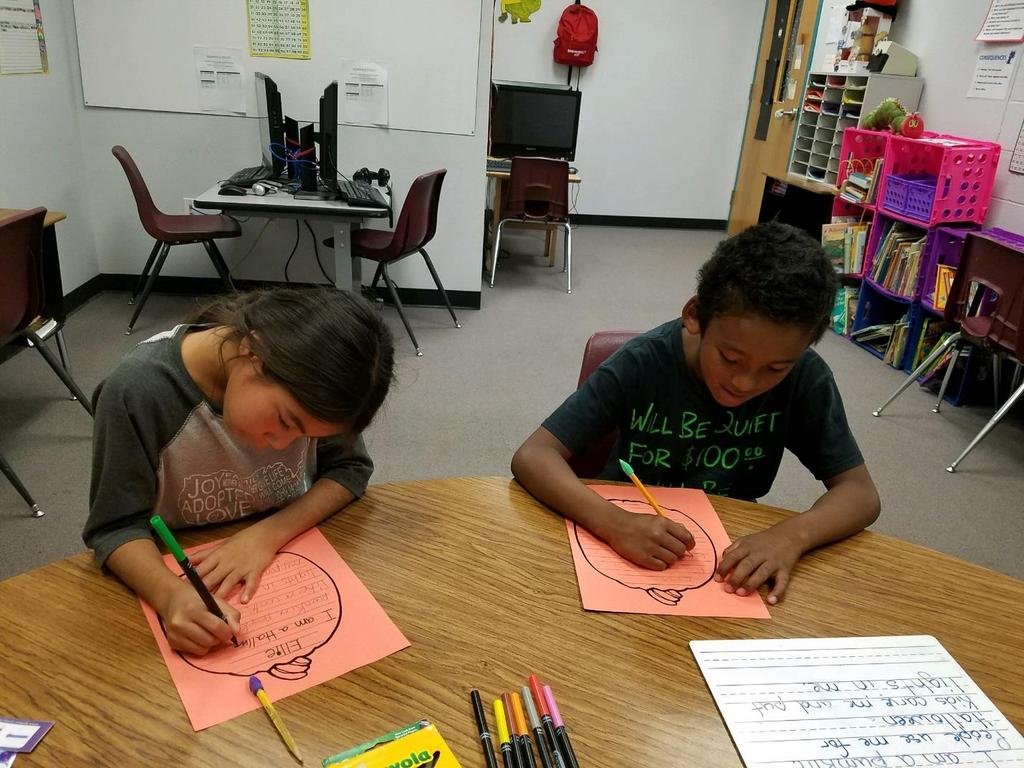 In Mrs. Weir s class, the student practiced their writing skills, working on correct sentence structure, great hand writing, and remembering to include the period at the end of the sentence.