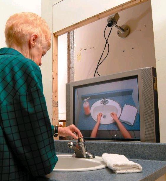 Another famous Application Learning and Using POMDP models of Patient-Caregiver Interactions During Activities of Daily Living Goal: Help Older adults living with cognitive disabilities
