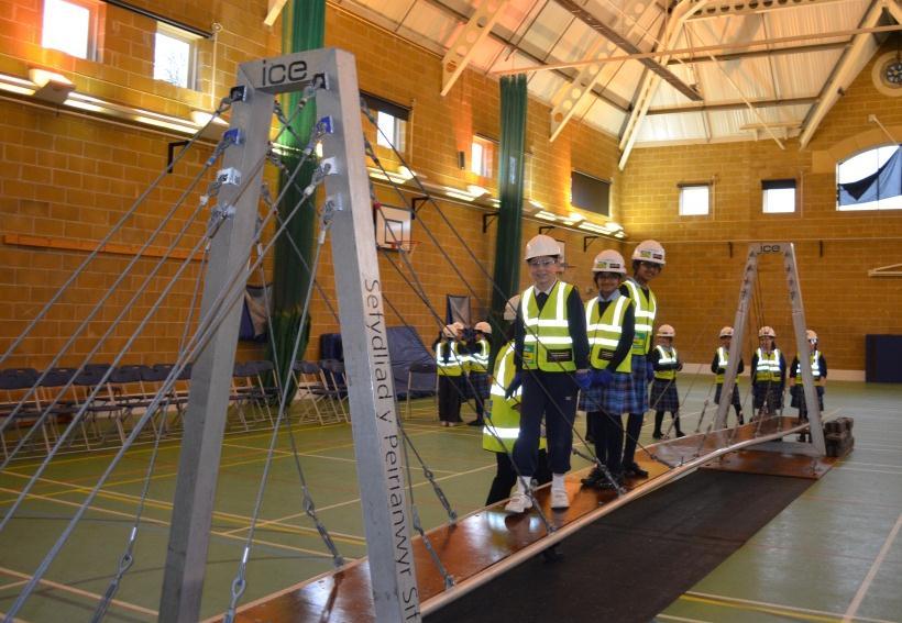 I.C.E. Bridge Building Project Women in Science Day on Tuesday was marked in style this year. The girls from Years 3 and 5 were treated to a special opportunity to build the I.C.E. Bridge, a large scale suspension bridge in the Sports Hall.