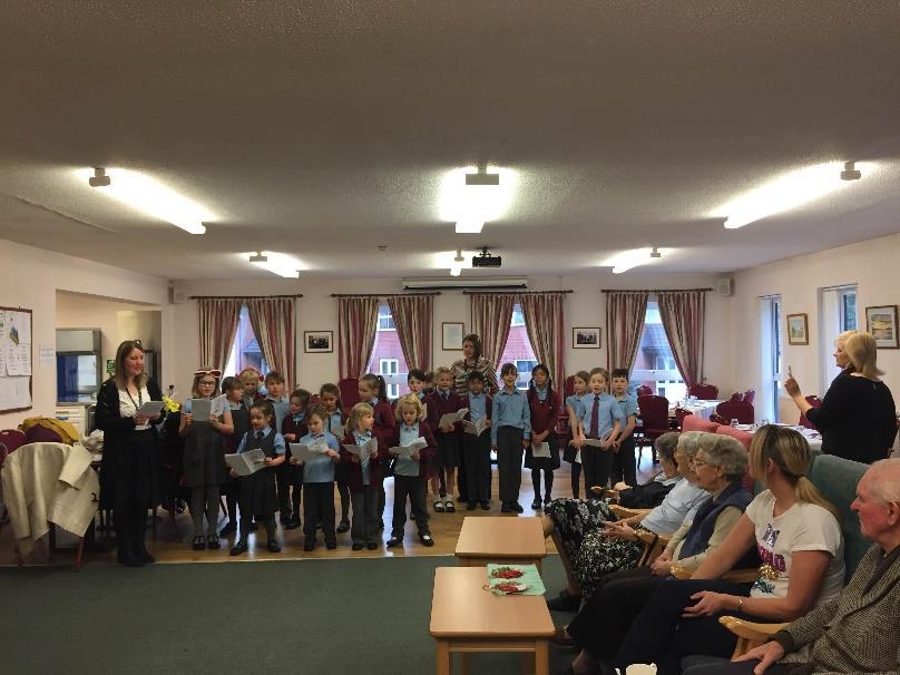 On Monday the choir walked to COATS Day Centre in Crowthorne and sang to the old people, this included a solo by Erin and joint singing by the