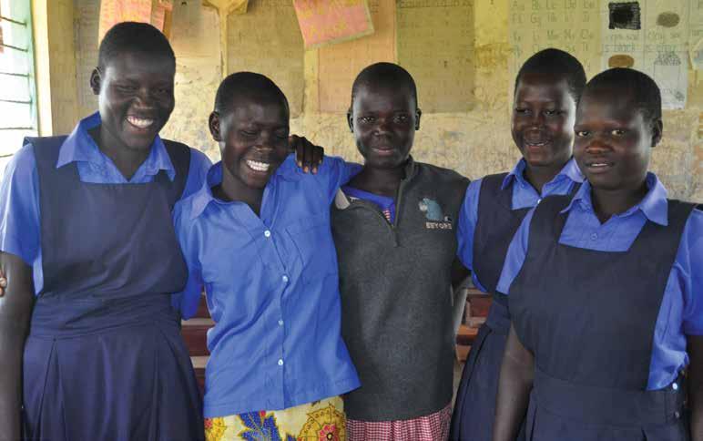 Helen (third from left) with her school friends Everybody deserves a second chance In an attempt to get dropouts back into school Build Africa is training Second Chance Champions (model pupils who