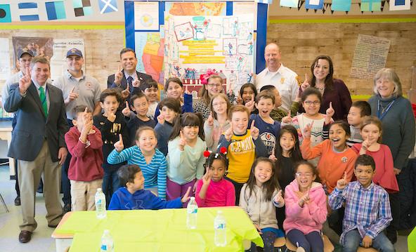 right, some Malden firefighters, teachers and students from Ms. Hall s 3rd grade Class at the Beebe School in celebrating the Fire Safety Poster Contest winning entry.