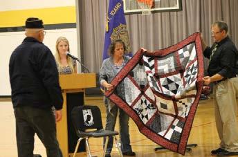 Keith Hall then gave a speech about veterans and their sacrifices. Following that, five Quilts of Valor were awarded to area veterans by Emma Johnson.