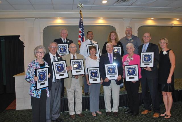 Section V Executive Hall of Fame Group picture of inductees and stand ins of the 2017 recipients First row L-R: Judi Knight, Ed Stores, Ted Woods, Mary Lou Bondi, Dick Cerone, Judy Shelton, Kevin