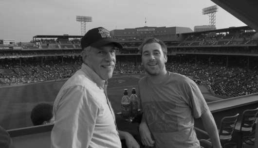 INTERVIEW WITH PETER DIAMOND 559 FIGURE 5. Diamond and son Andy on Green Monster at Fenway Park, 2006.