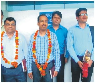 PAGE 4 VISITORS IOCL Representatives: L-R, Mr. R.V. Prabhu, Mr. Dhananjay Sahu, Mr. Akhil Tyagi seen with Mr.