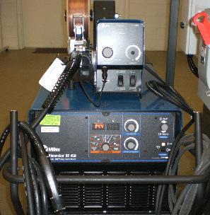 Figure 7. Static picture of a welding machine (left), and 3D interactive model of the same machine (right).
