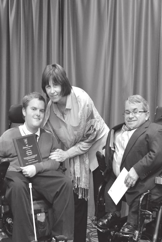 Disability Services Graduate Assistant Donelle Henderlong presents the 2015 Max Adamson Award to Megan Miller (left).