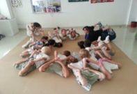 The students have been practicing dancing, yoga, gymnastics,