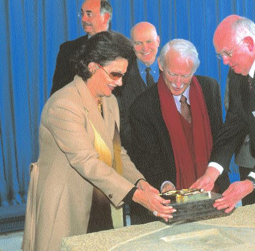 John Gerhart (center), AUC s late President Emeritus, lays the cornerstone for the new campus with Egypt s First Lady Suzanne Mubarak and Board of Trustees Chairman Paul Hannon BREAKING GROUND AUC